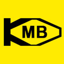 K.M.B.